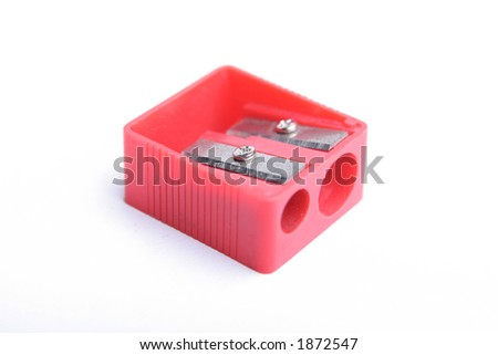 Red pencil sharpner on white background