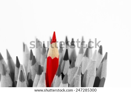 Red pencil standing out from others