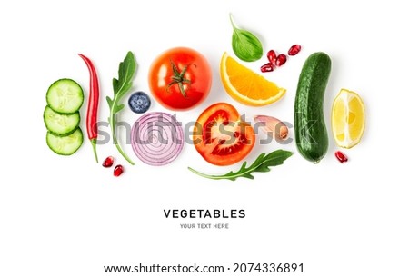 Red pepper, basil, orange, onion, rucola, tomato, cucumber, lemon and garlic creative layout isolated on white background. Healthy eating and food concept. Fresh salad vegetables. Top view, flat lay
