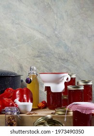 Red Pepper Jelly Canning Preserving Equipment And The Filled Jars