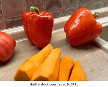Red pepper, tomato and carrot are ready to eat - Shutterstock ID 2370106415