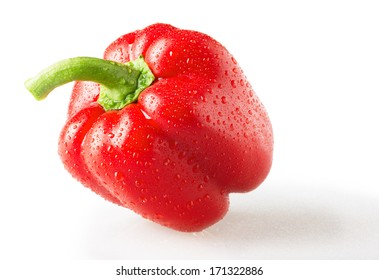 Red pepper with water drops isolated on white background