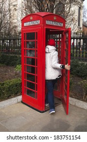 Red Phone Booth In Park, London. UK.