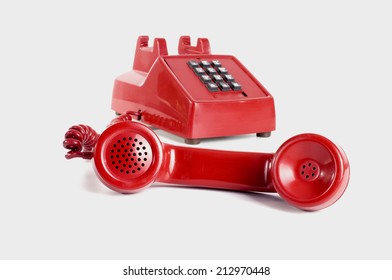 Red Phone With The Handset Off The Hook