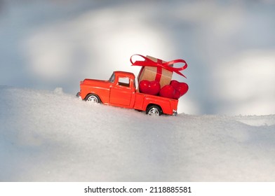 A Red Pickup Truck Carries Red Hearts And A Gift Box With A Red Bow In The Back