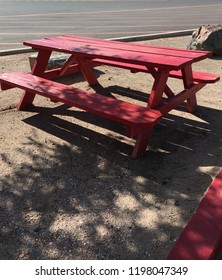 Red Picnic Table With Seats At Truck Stop In Arizona In Shade Of Tree