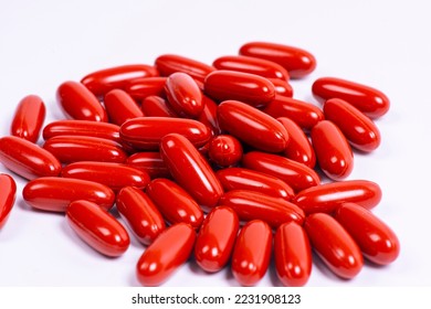 Red pill capsules isolated. red medical pills.