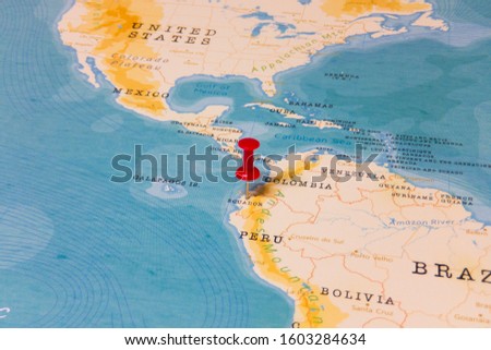 A Red Pin on Ecuador of the World Map