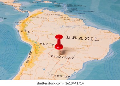 A Red Pin on Paraguay of the World Map