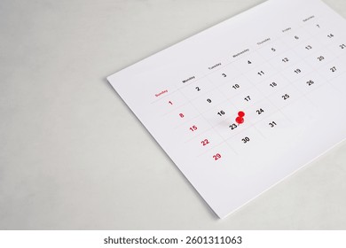 red pin stack on calendar for background