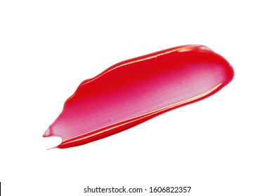 Red pink lip gloss smear smudge. Glossy lipstick swatch isolated on white background. Cosmetic beauty product swipe. Make-up texture