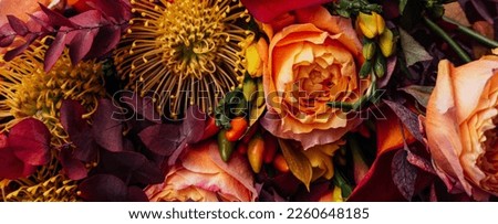 Red pink magenta orange Autumn Colorful fall bouquet. Beautiful flower composition with autumn orange and red flowers. Flower shop and florist design concept. close up, floral background