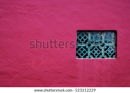 Red plain wall with window