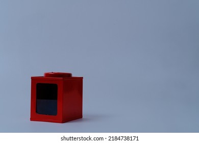 Red Plastic Box On Gray Background