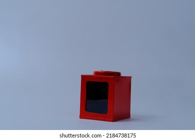 Red Plastic Box On Gray Background