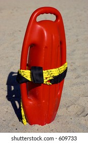 Red Plastic Buoyancy Aid In The Sand, Cala Bona Beach, Mallorca, Majorca, Spain