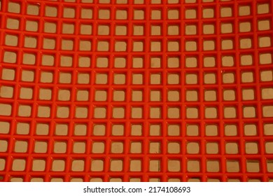 Red plastic chair texture on beige background - Shutterstock ID 2174108693