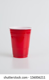 Red Plastic Glass On A White Background