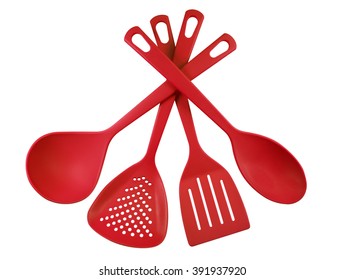 Red Plastic Kitchen Utensils Isolated On White. Clipping Path Included.