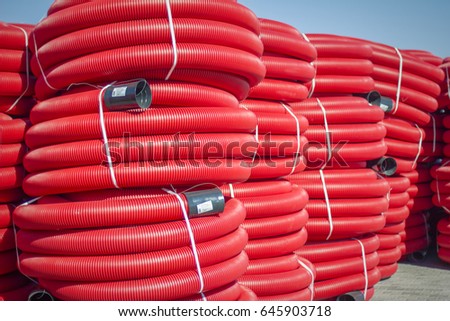 red plastic pipe background