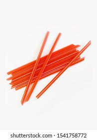 Red Plastic Straws Isolated In White Background