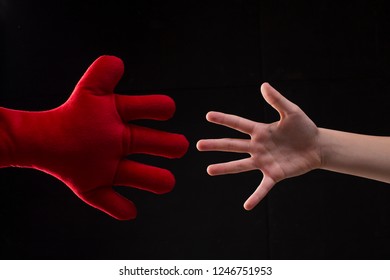 Red Plush Toy Hand Reaching Out For Help, Handshake With Imaginary Friend