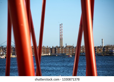 Red Poles In Grand Canal Square In Dublin City, Ireland. The Square Was Designed By American Landscape Architect Martha Schwartz
