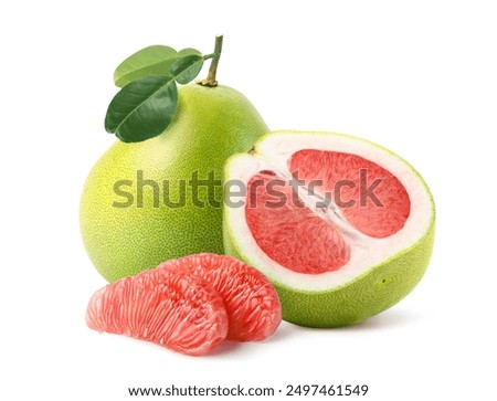 Red pomelo fruit with pulp and cut in half isolated on white background.