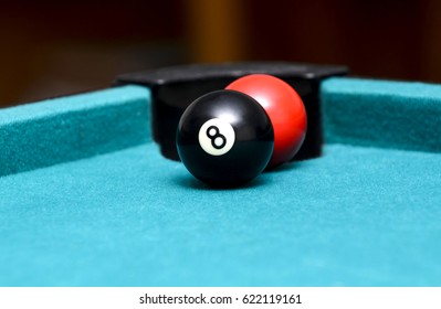 Red Pool Ball Behind The Eight Ball