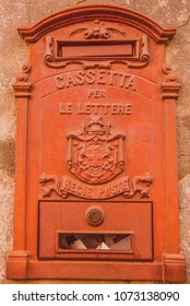 red post box on wall in Orvieto, Rome suburb, Italy 
Mailbox for mail. Regie Poste - the name of Italian Postservice