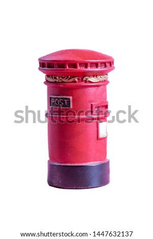 Red postbox on white background