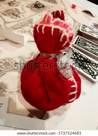 red pouch among the esoteric table