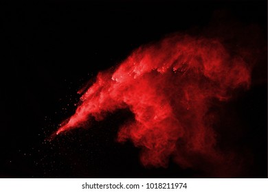 Red Powder Explosion On Black Background.
