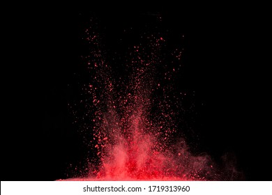 Red Powder Explosion On Black Background.