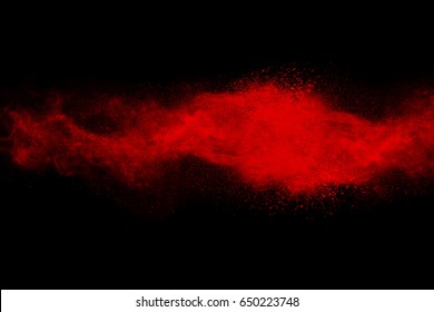 Red Powder Explosion On Black Background.