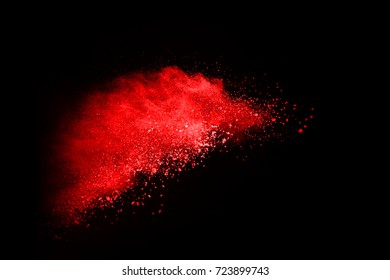 Red Powder Explosion On Black Background.