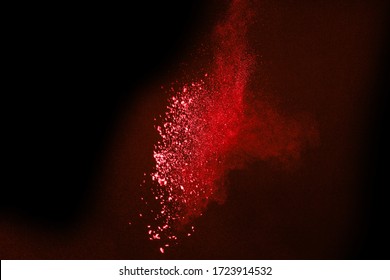 Red Powder Explosion On White Background. Colored Cloud. Colorful Dust Explode. Paint Holi.