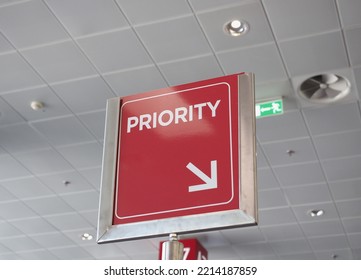 Red Priority Queue Sign At Airport Boarding