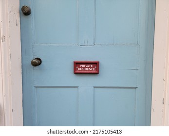 Red Private Residence Sign On Blue Wood Door On House Or Home