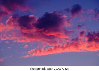 Red And Purple Clouds In The Sunset Sky.