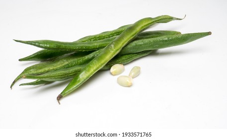 red purple Indian surti,valor papdi beans,Hyacinth bean, Lablab purlieus with flower and leaves in basket on wooden background - Shutterstock ID 1933571765