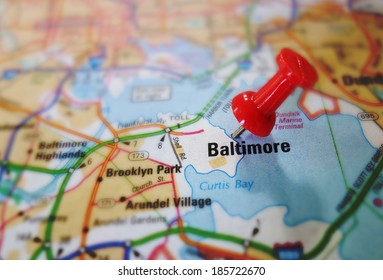 Red push pin in a map of Baltimore Maryland                               
