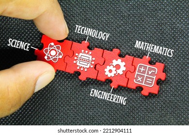 red puzzle connection with STEM icon. science, technology, engineering, mathematics education word with icons - Shutterstock ID 2212904111