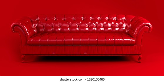 Red quilted leather sofa on red background front view. Creative concept of minimalistic interior, stylish vintage chester sofa. Single piece of furniture. Bright luxury red couch