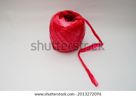 Red raffia isolated on white background Foto d'archivio © 