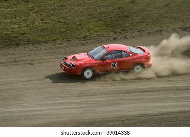 Red Rally Car In A Race