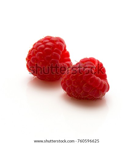 Red raspberries isolated on white background pair
