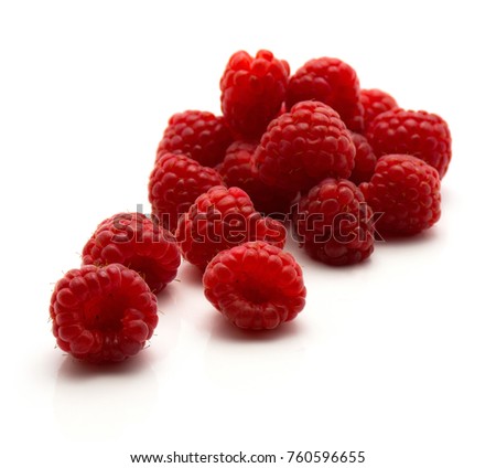 Red raspberries isolated on white background fresh heap
