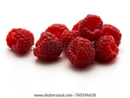 Red raspberries isolated on white background heap
