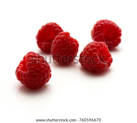 Red raspberries isolated on white background
